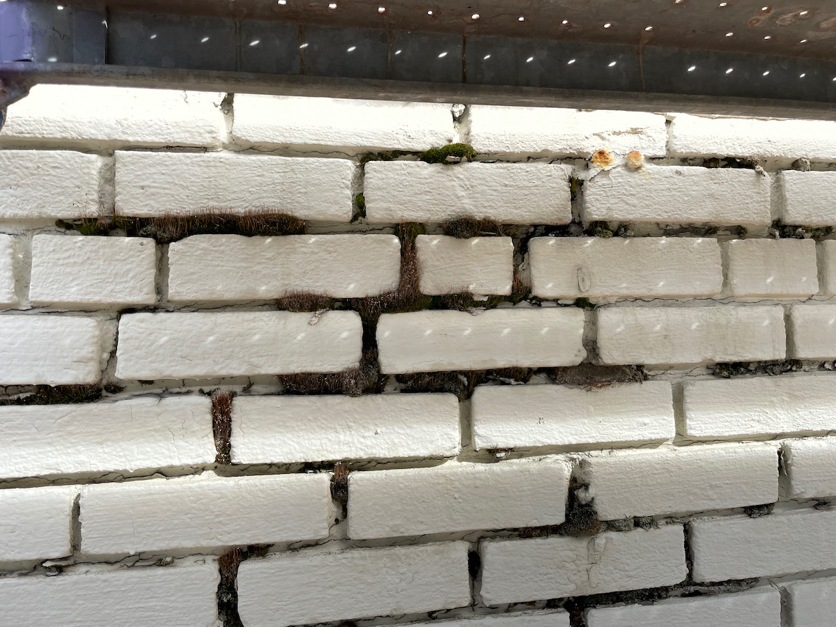 Brick masonry parapet wall