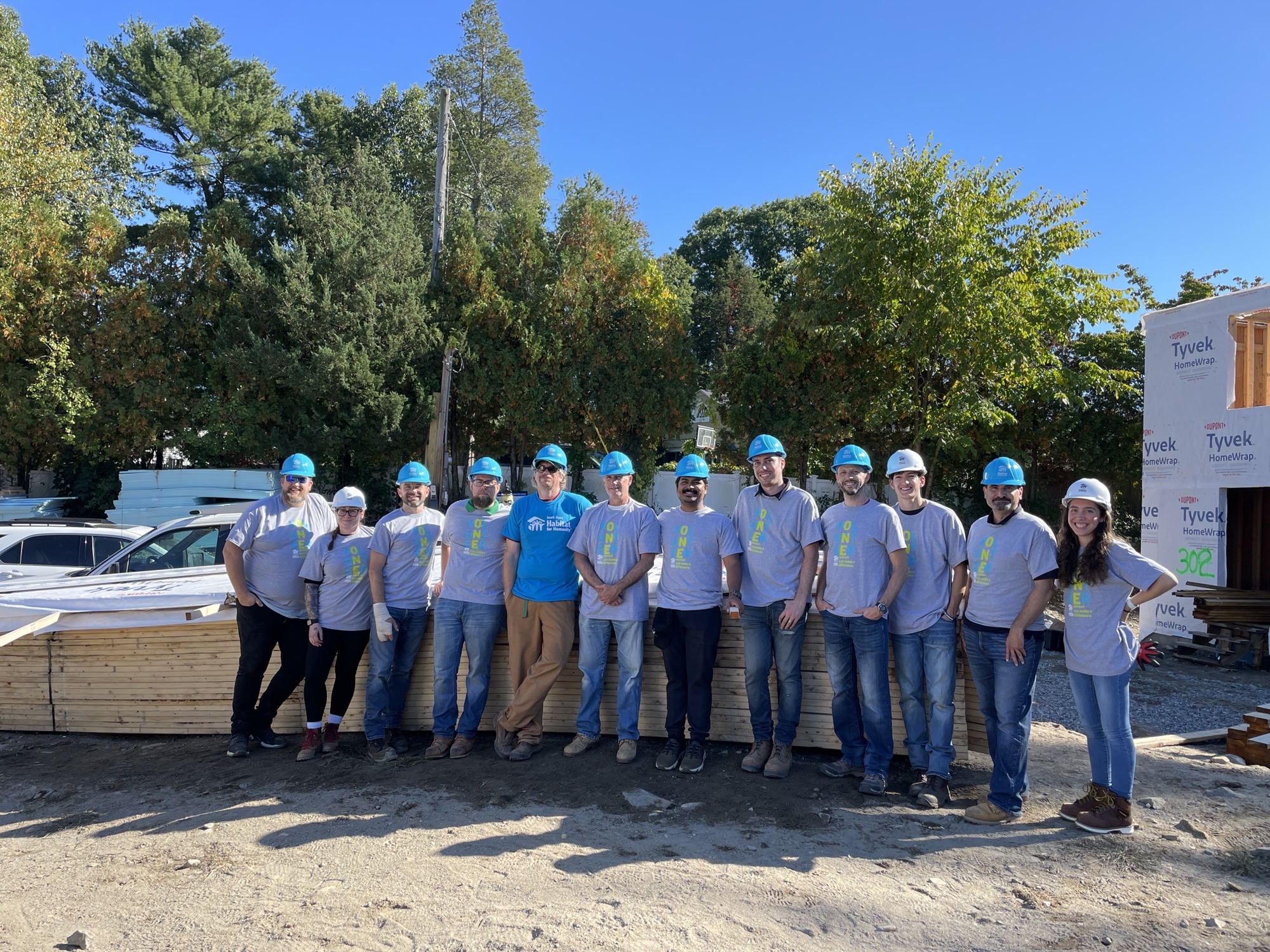 the CopelandBEC team with our colleagues from Tripi Engineering Services at a Habitat for Humanity build in 2022