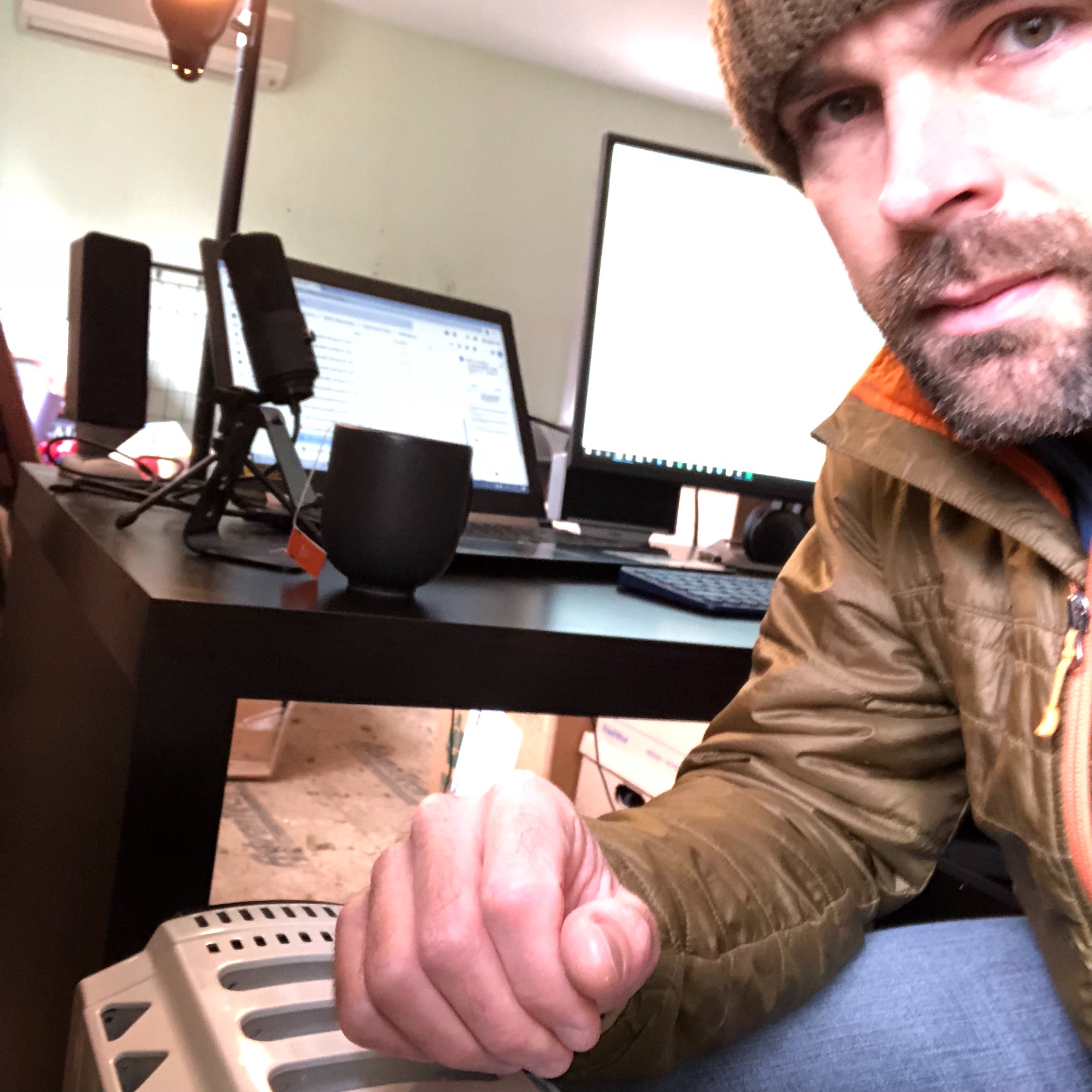 Here I am bundled up and huddled next to the space heater as temps plummeted in my unheated garage office.